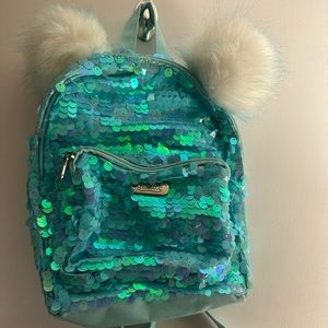 Justice, girls mini blue sequins backpack.
